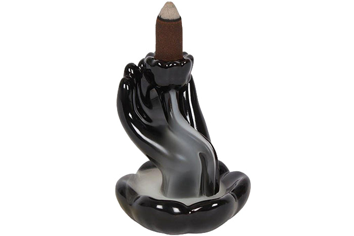 porcelain-backflow-burner-hand-on-lotus-71470